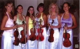 Photo of the Horizons Chamber Ensemble - six woman posed with their violins